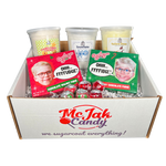 Load image into Gallery viewer, Our Christmas Gift Set includes: 1 Christmas Story chocolate fudge box, 1 Christmas Story chocolate walnut fudge box, 1 yellow snow cotton candy, 1 Christmas cookie cotton candy, 1 snowflake cotton candy & 6 lollipops (wild cherry and candy apple)